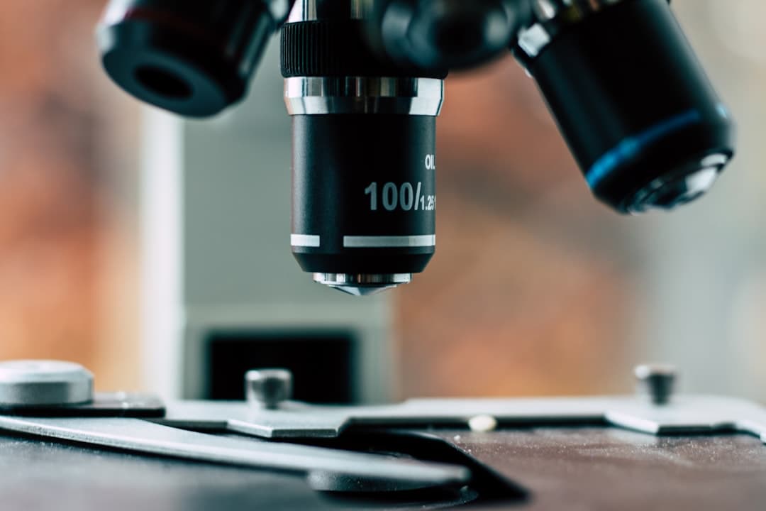 black microscope. Cover image for: AI Medical Scribe for IVF and Fertility Clinics.