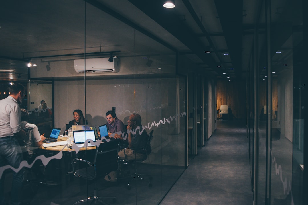group of people having a meeting. Cover image for: The AI Scribe Free Trial Trap: What to Actually Test in Two Weeks.