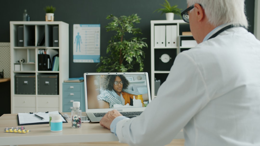 Doctor consults with patient via video call.. Cover image for: AI Scribe for Telehealth-Only Practices: Why It's the Best-Fit Use Case.