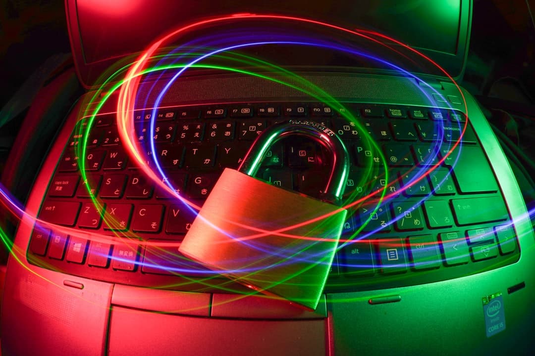 padlock on laptop with light trails. Cover image for: HIPAA Violations With Medical Transcription: Real Cases and How to Avoid Them.
