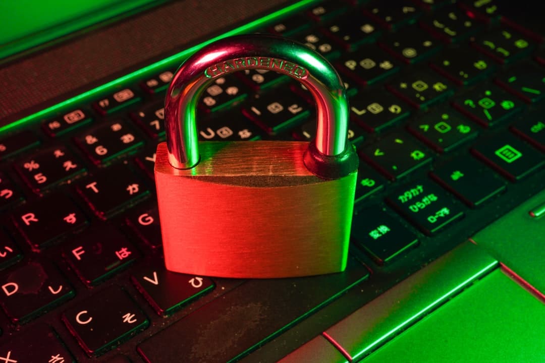 red padlock on black computer keyboard. Cover image for: Patient Consent for AI Medical Scribe Recording: State-by-State Guide.